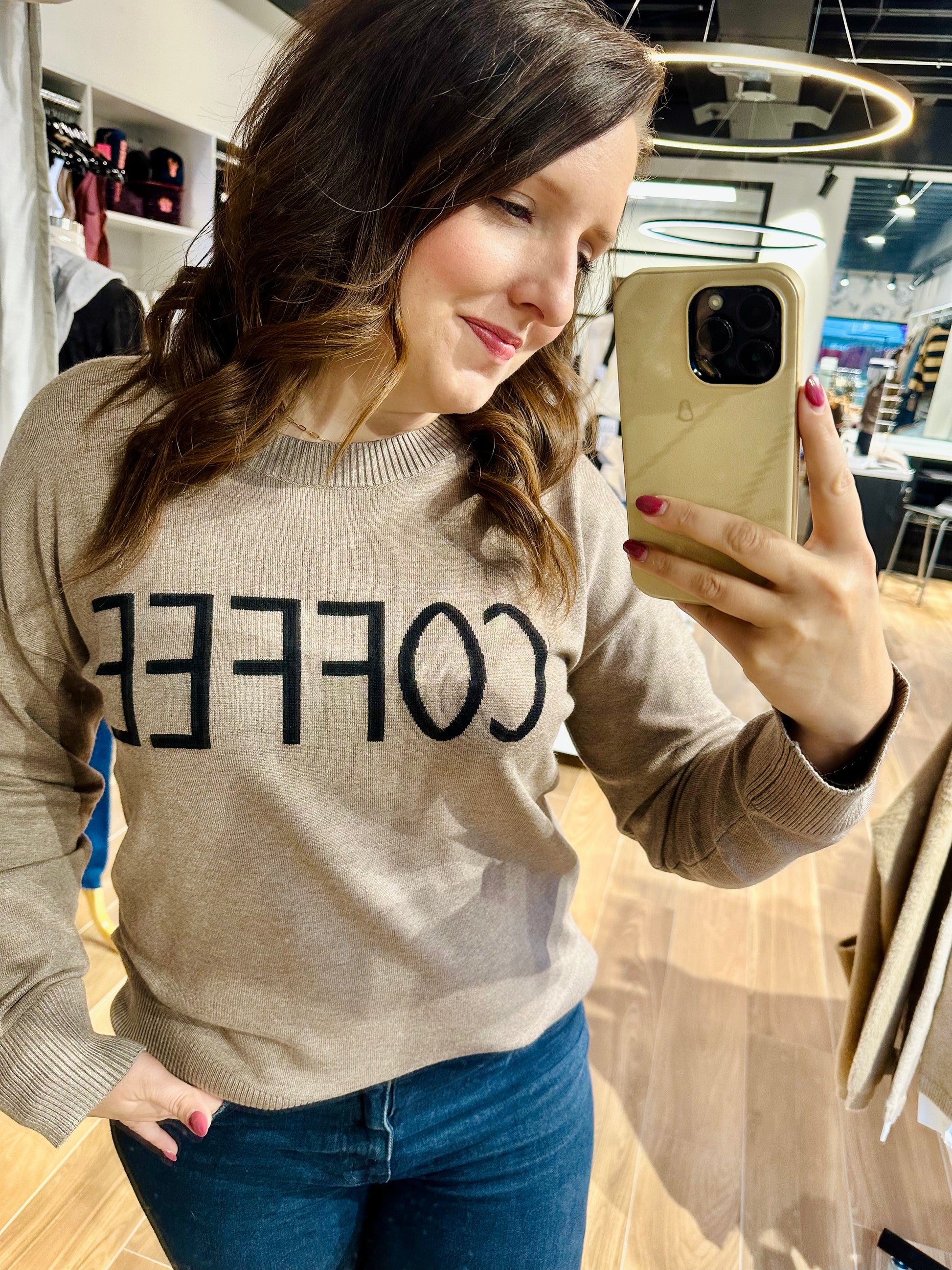 Hem and 2025 thread striped sweater