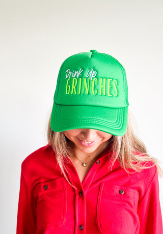 Drink Up Grinches Trucker Hat